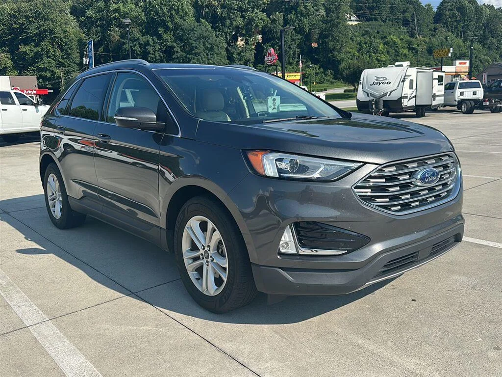 Used 2019 Magnetic Metallic Ford SEL image 1