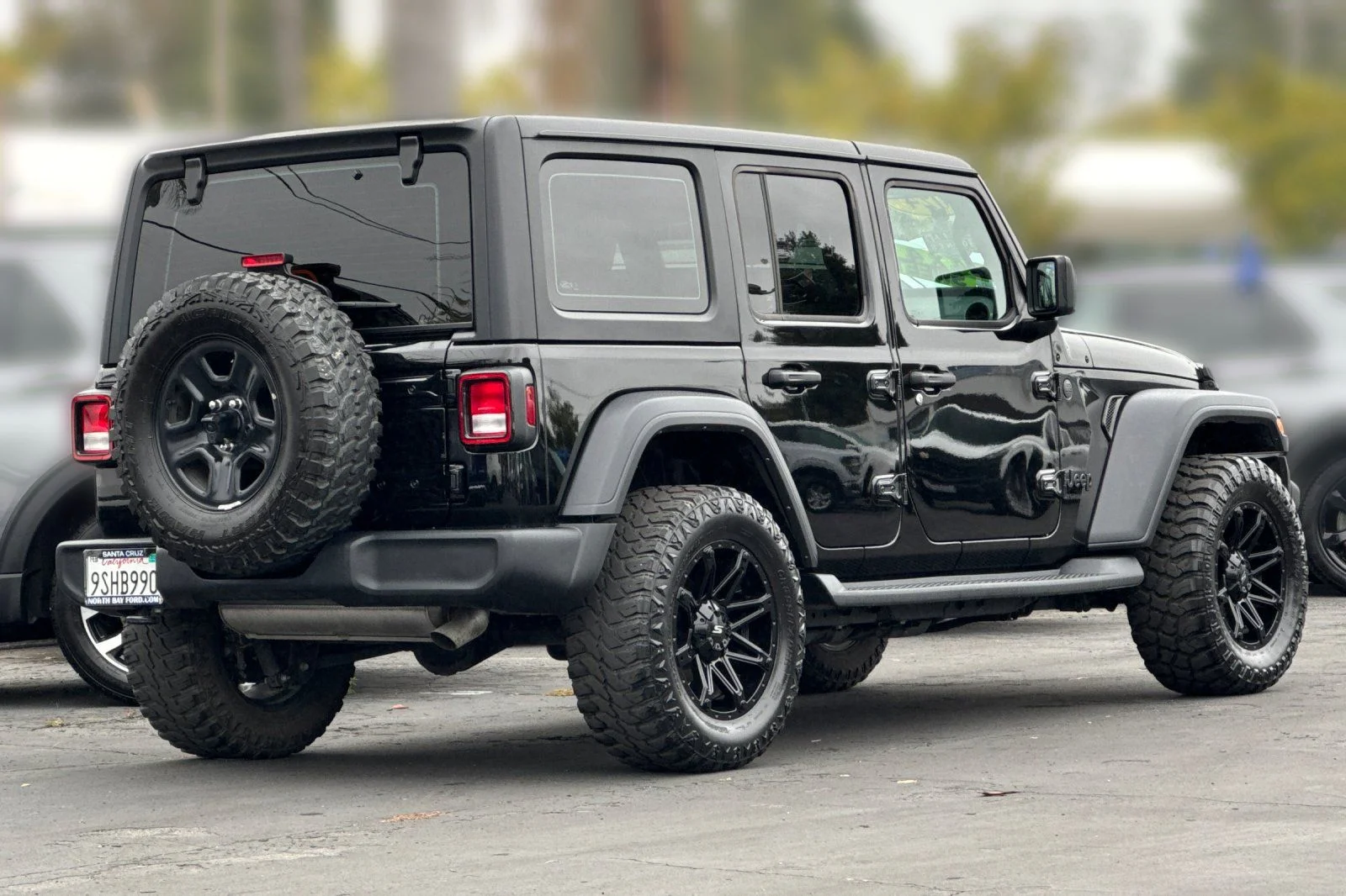 Used 2024 Black Clearcoat Jeep Sport image 27