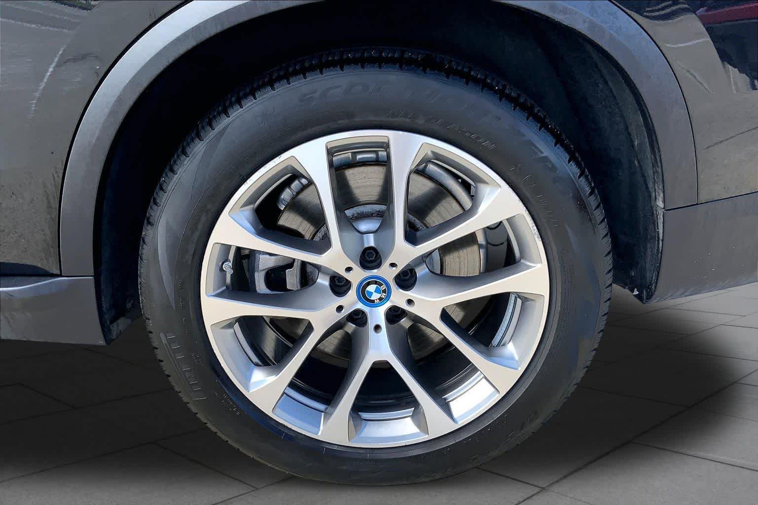 Used 2025 Black Sapphire Metallic BMW xDrive50e image 11