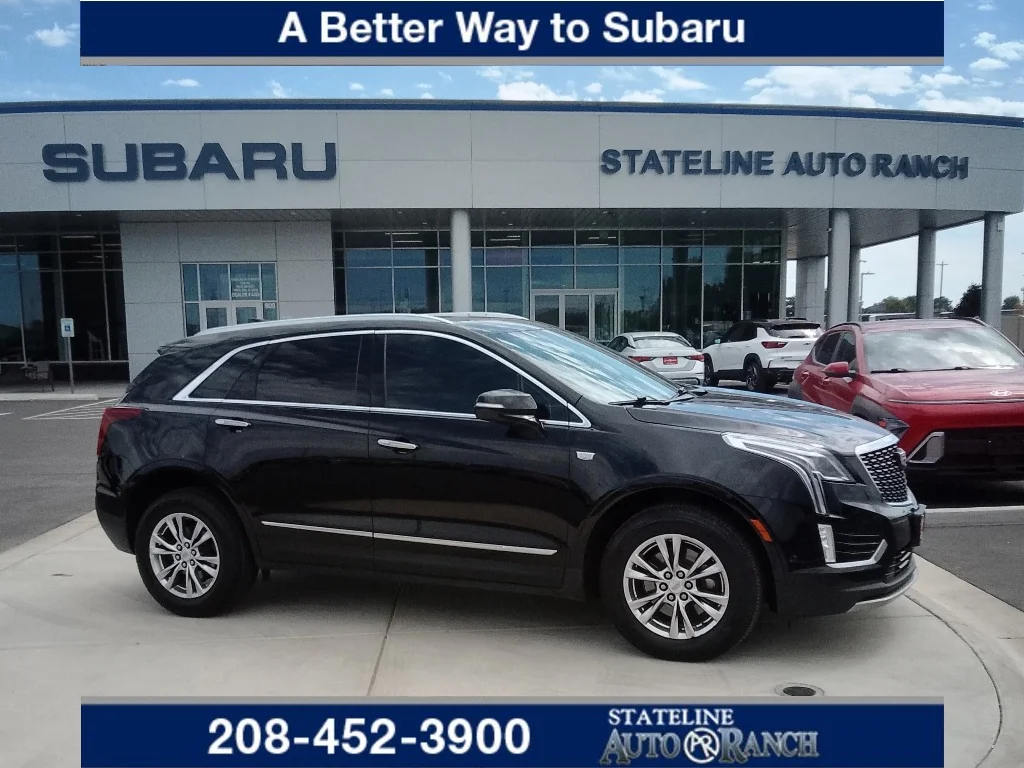 Used 2020 Stellar Black Metallic Cadillac Premium Luxury FWD image 1