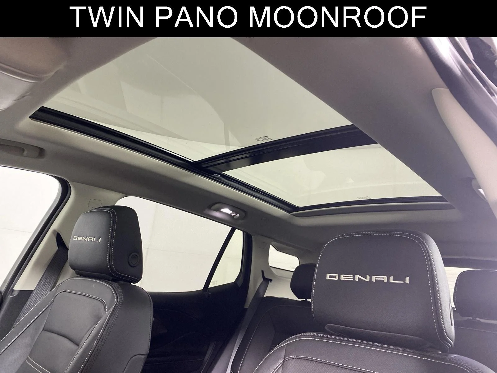 Used 2024 Ebony Twilight Metallic GMC Denali image 2