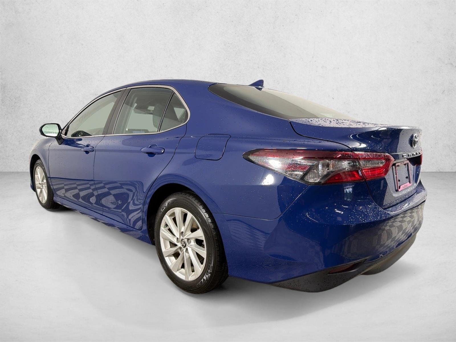 Used 2024 Reservoir Blue Toyota LE image 5