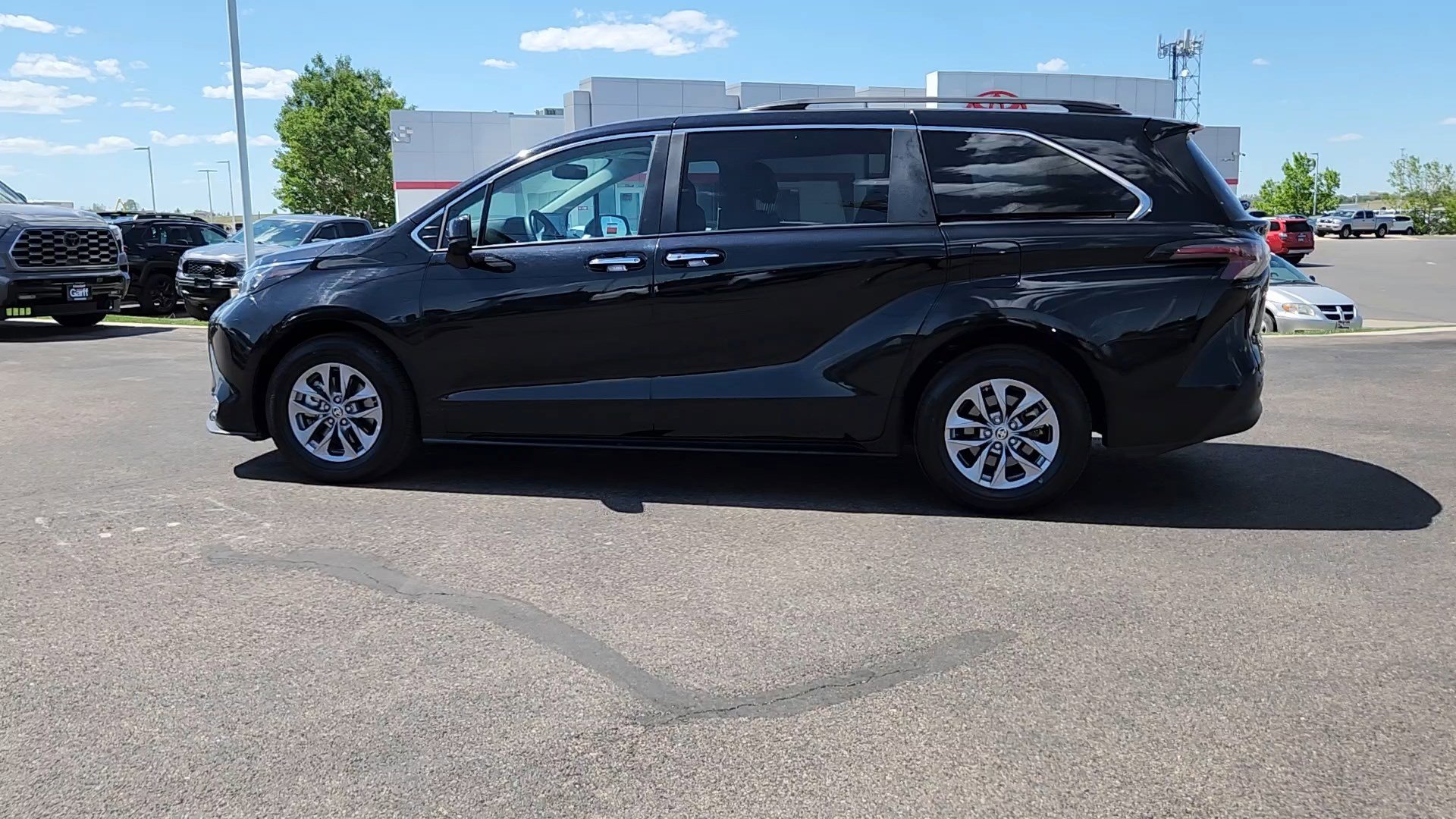 Used 2024 Midnight Black Metallic Toyota XLE image 2