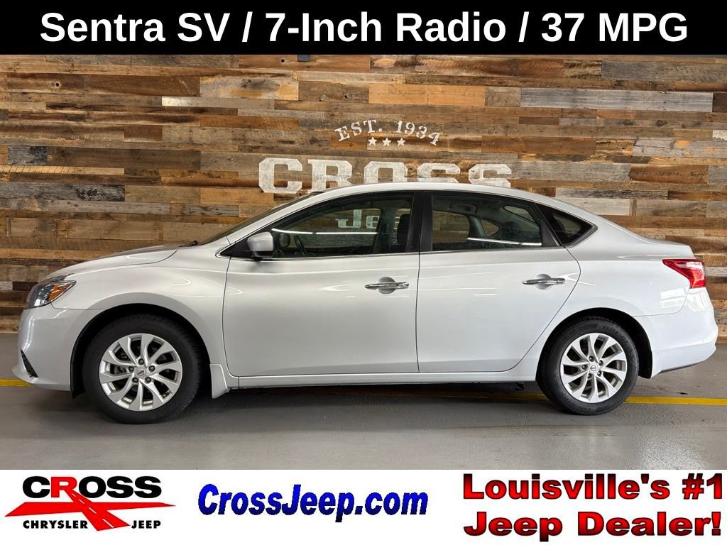 Used 2019 Brilliant Silver Metallic Nissan SV image 1