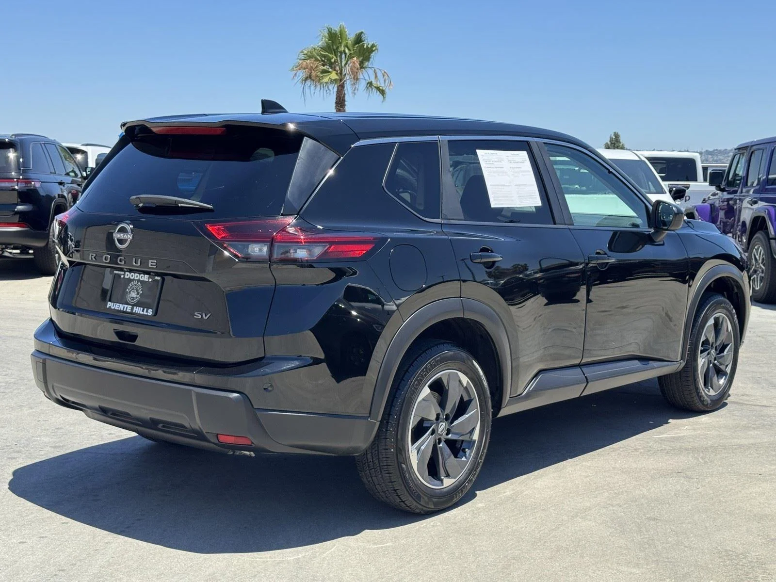 Used 2024 Super Black Nissan SV image 6