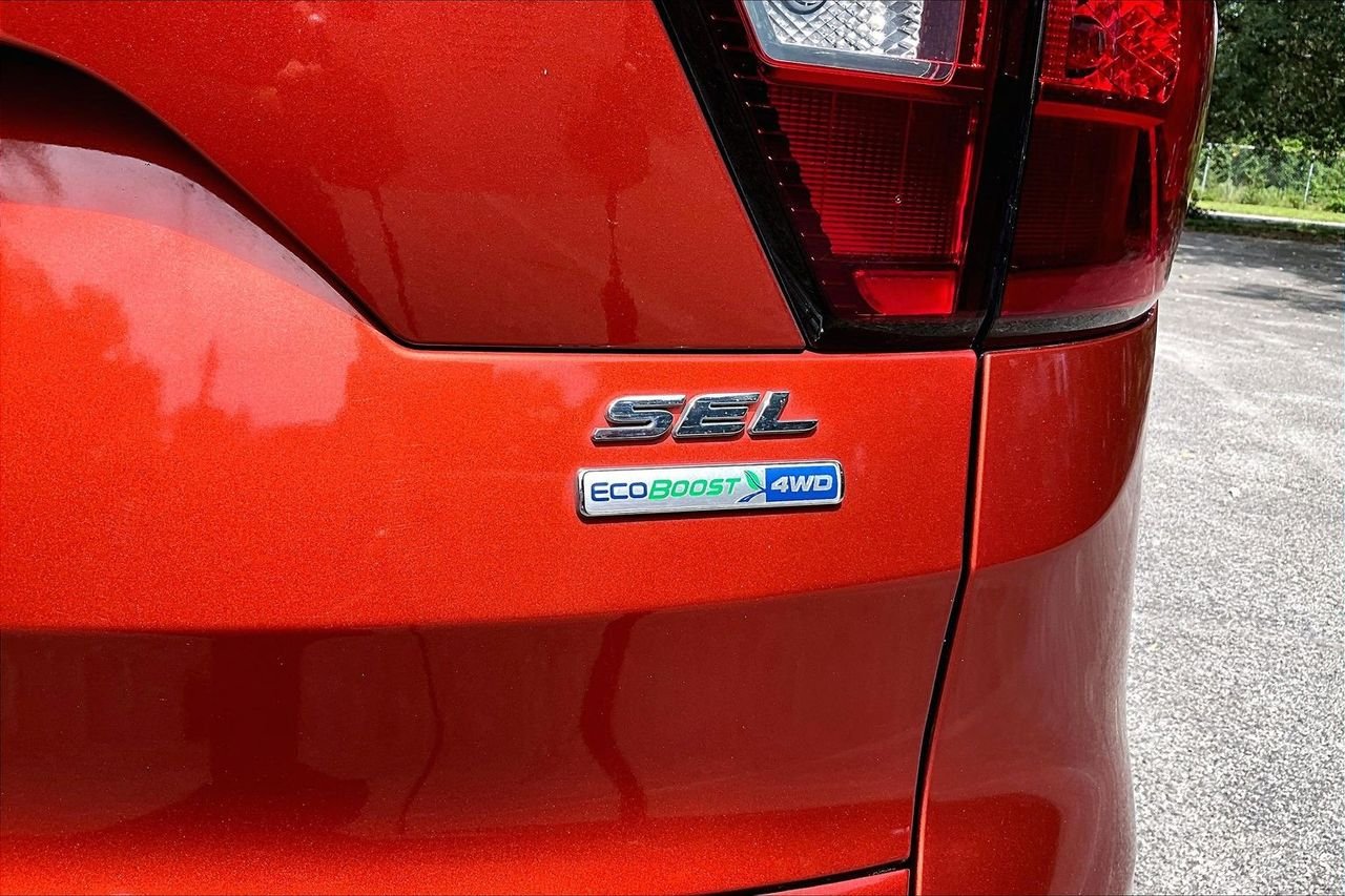 Used 2019 Orange Ford SEL image 21