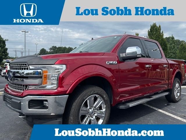 Used 2019 Ruby Red Metallic Ford Lariat image 1