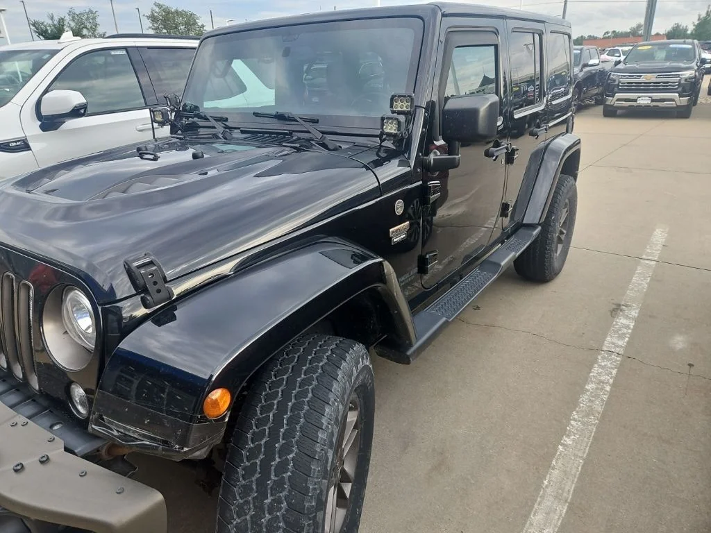 Used 2017 Black Jeep Unlimited Sahara image 2
