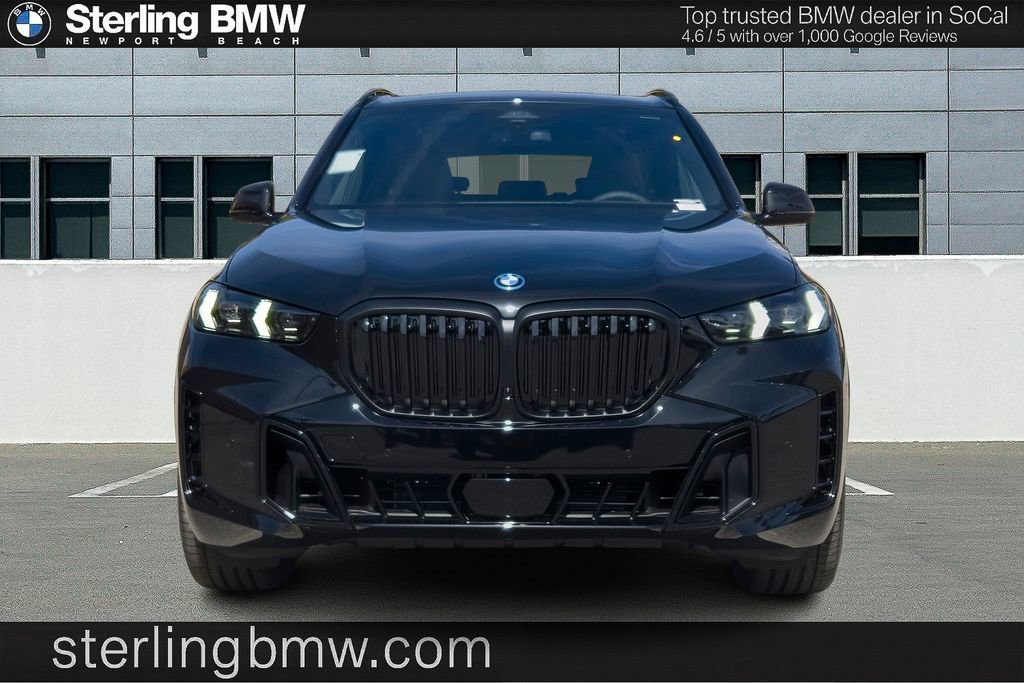 New 2026 Black Sapphire Metallic BMW xDrive50e image 2