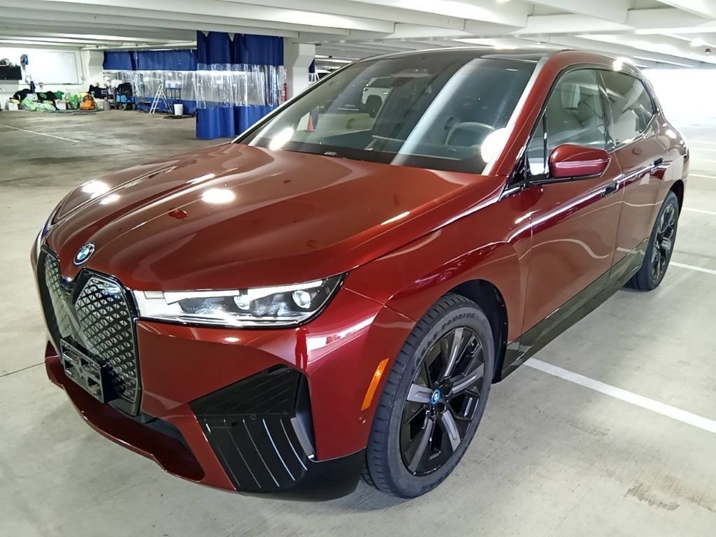 Used 2024 Red BMW xDrive50 image 1