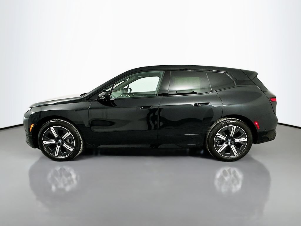 Used 2026 Black Sapphire Metallic BMW xDrive60 image 8