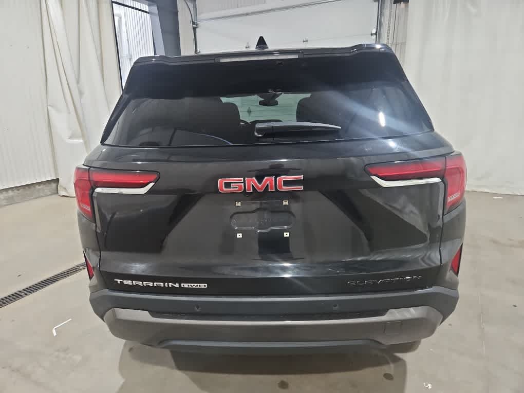 Used 2026 Ebony Twilight Metallic GMC AWD Elevation image 3