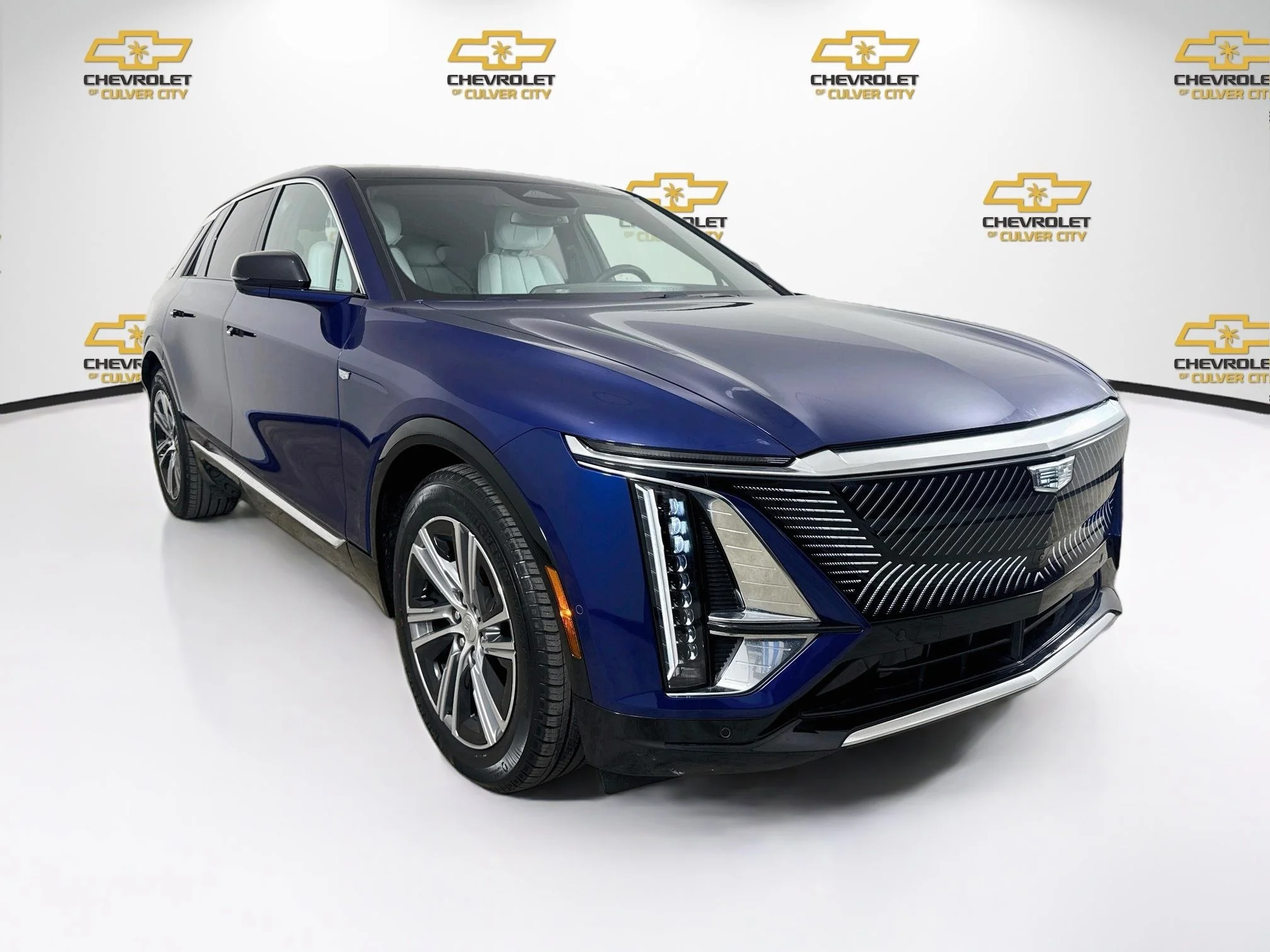 Used 2024 Opulent Blue Metallic Cadillac Luxury 1 image 1