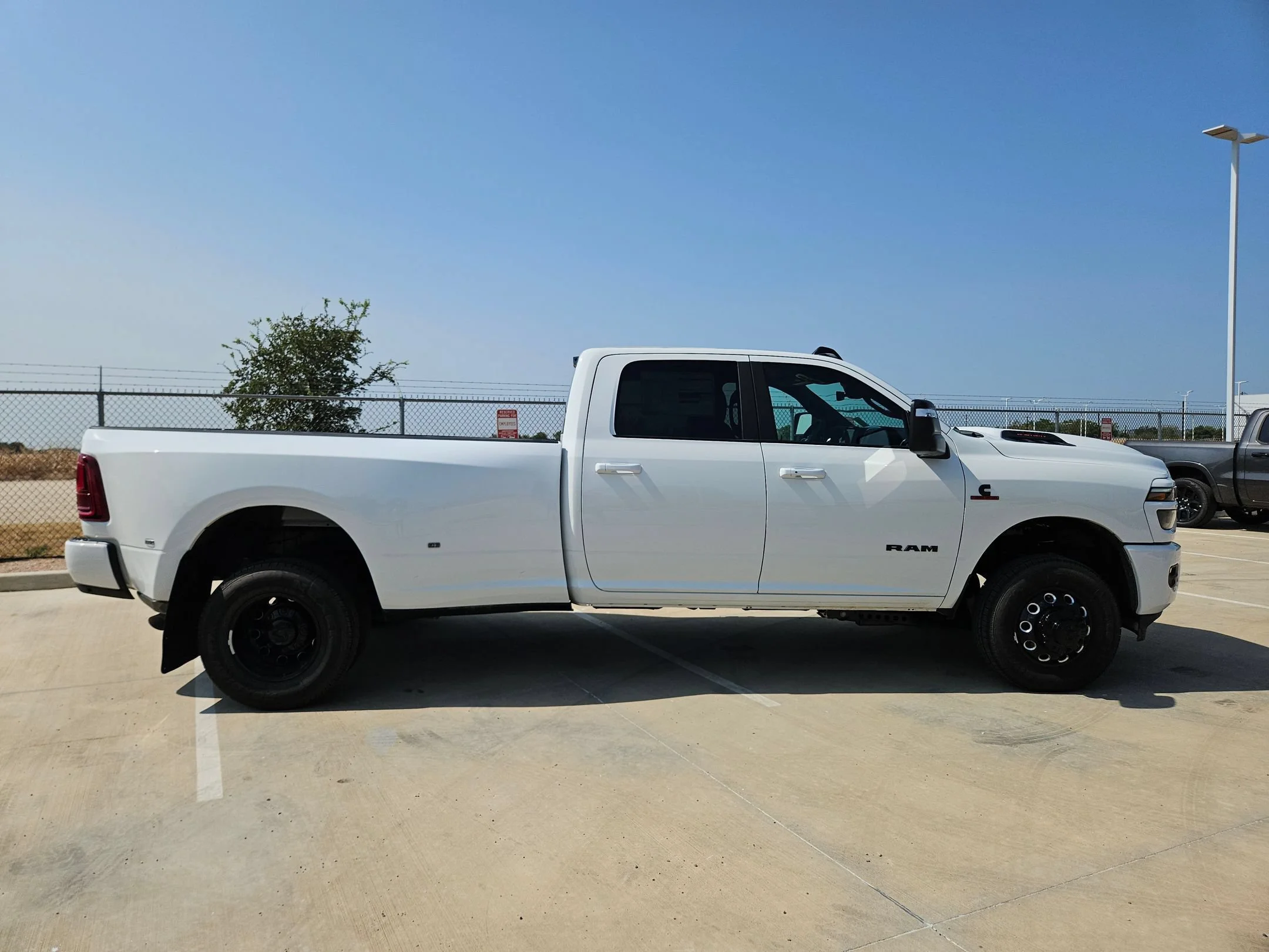 New 2026 Bright White Clear-Coat Exterior Paint RAM Laramie image 2