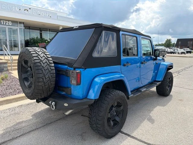 Used 2016 Blue Jeep Unlimited Sahara image 6