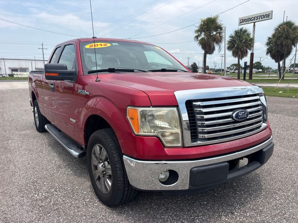 Used 2012 Red Ford XLT image 1