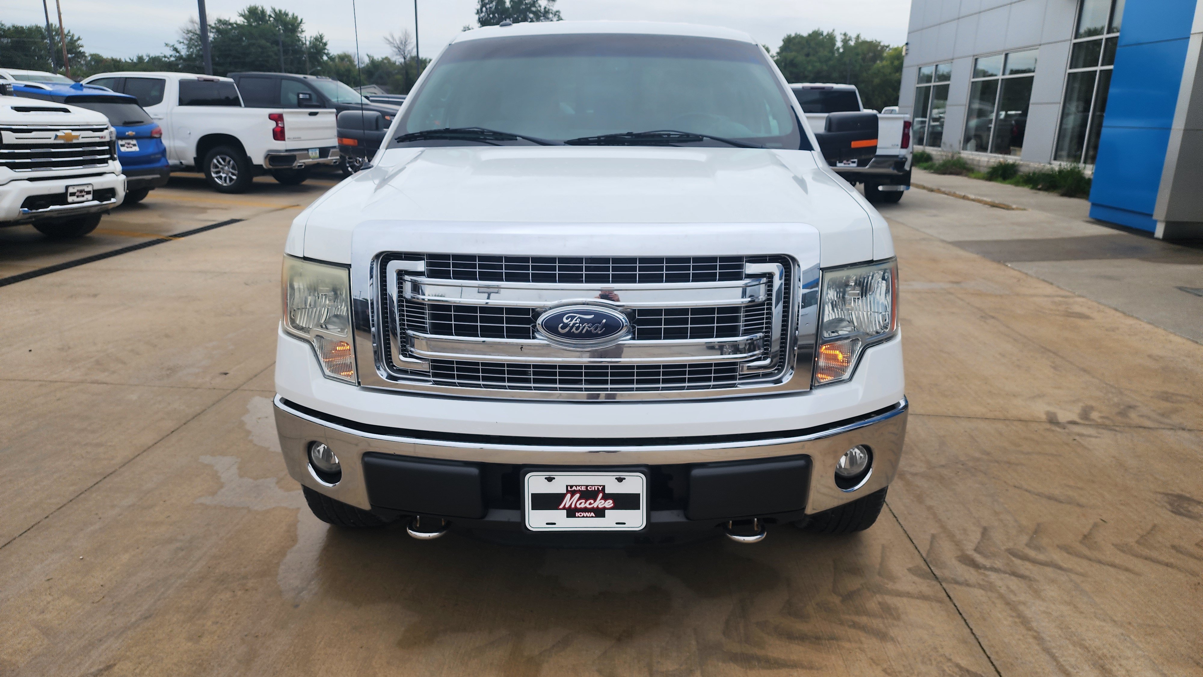 Used 2013 Ford F-150 XLT with VIN 1FTFW1EF0DKG27951 for sale in Lake City, IA