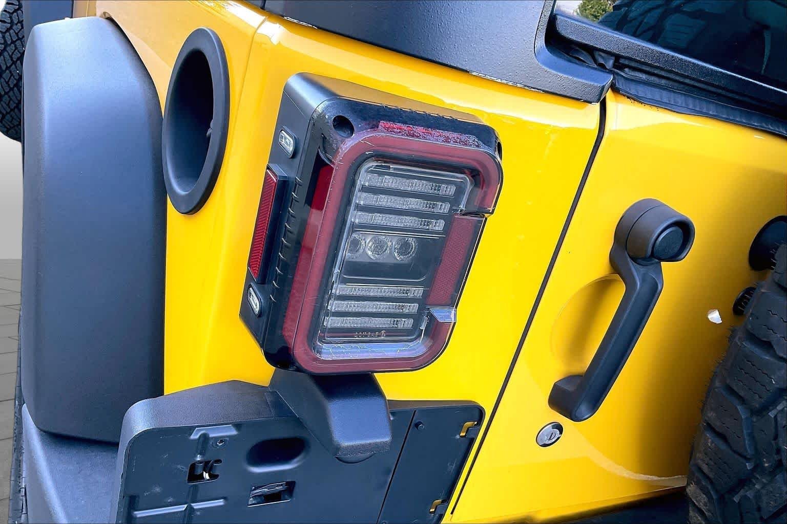 Used 2015 Baja Yellow Clearcoat Jeep Sport image 26