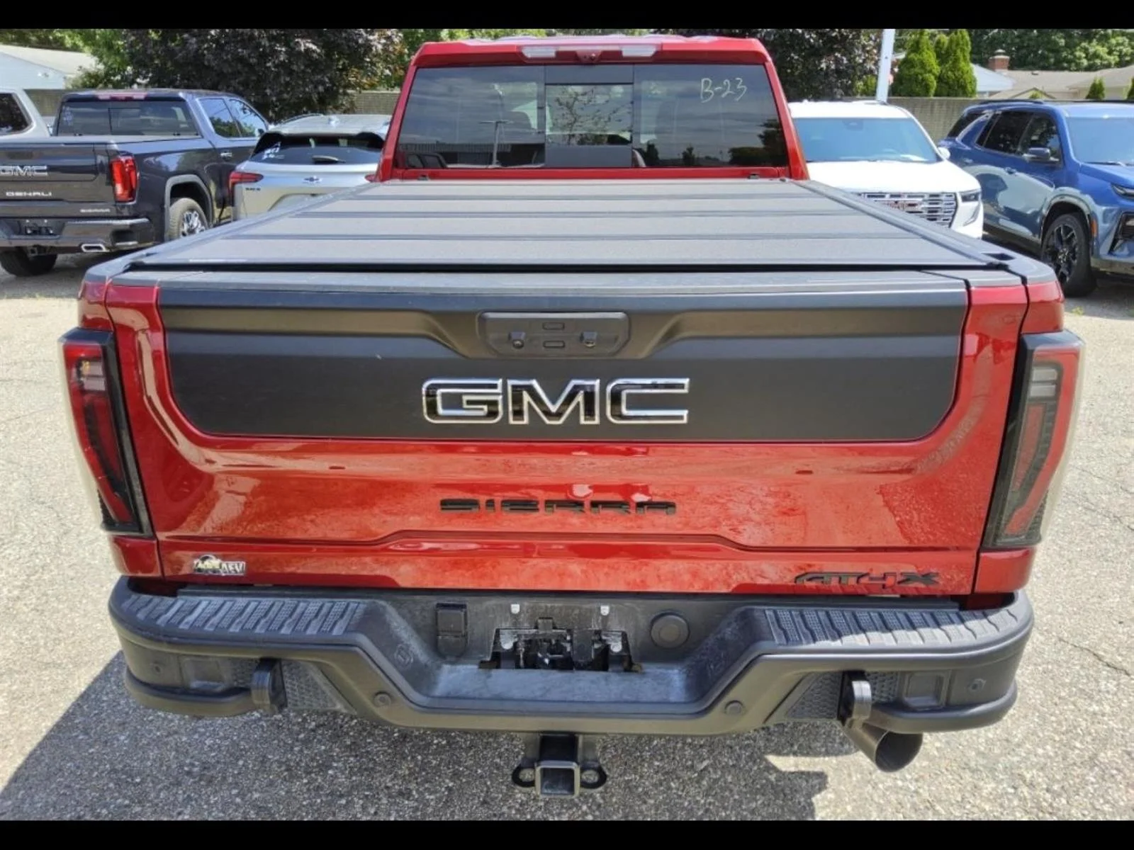 Used 2026 Volcanic Red Tintcoat GMC AT4X image 5