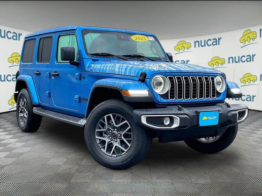 Used 2025 Hydro Blue Pearl Coat Jeep Sahara image 1