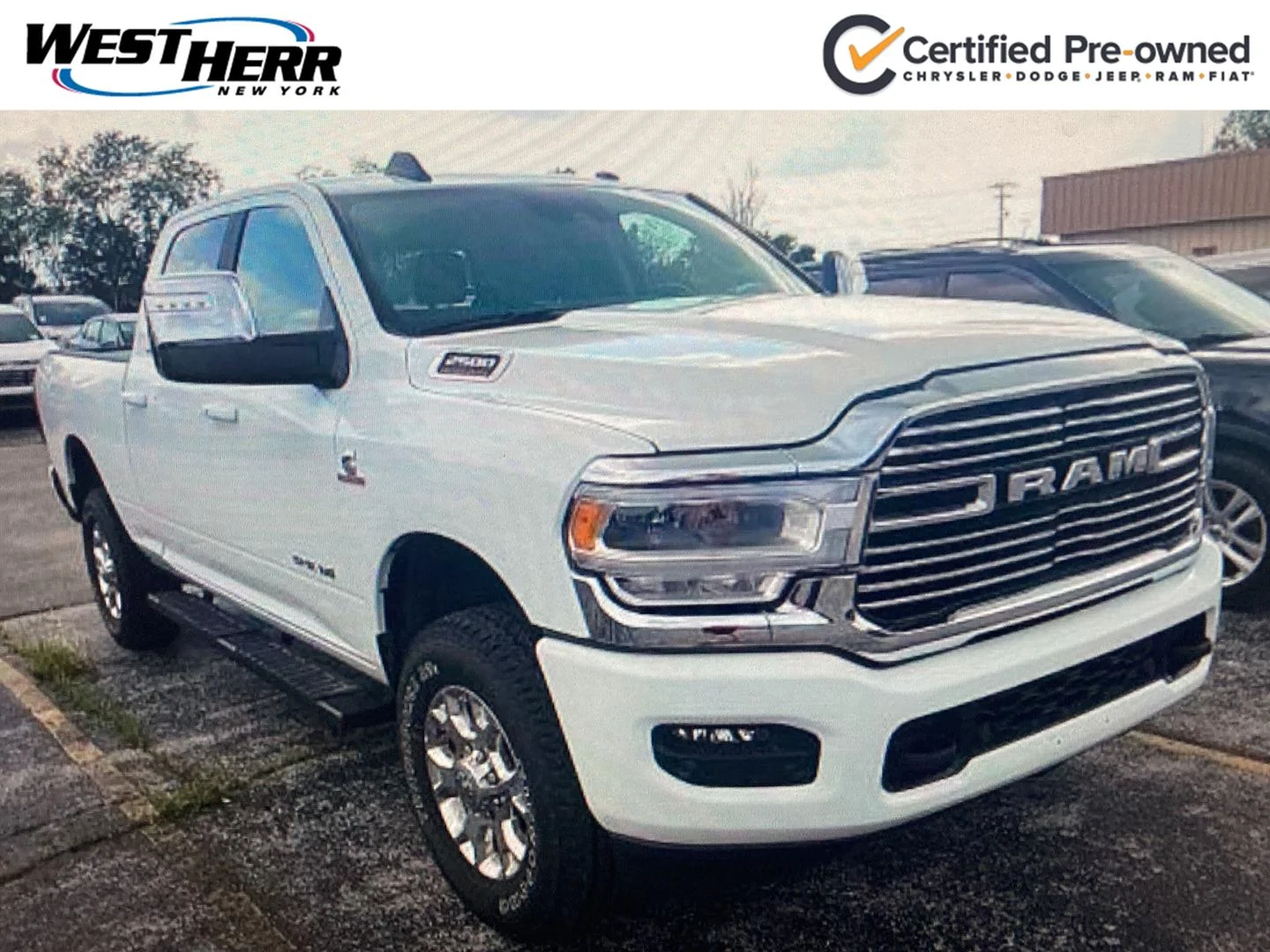 Used 2024 Bright White Clearcoat Ram Laramie image 1