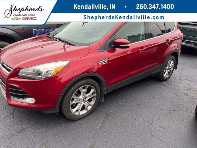 Used 2013 Red Ford Titanium image 1