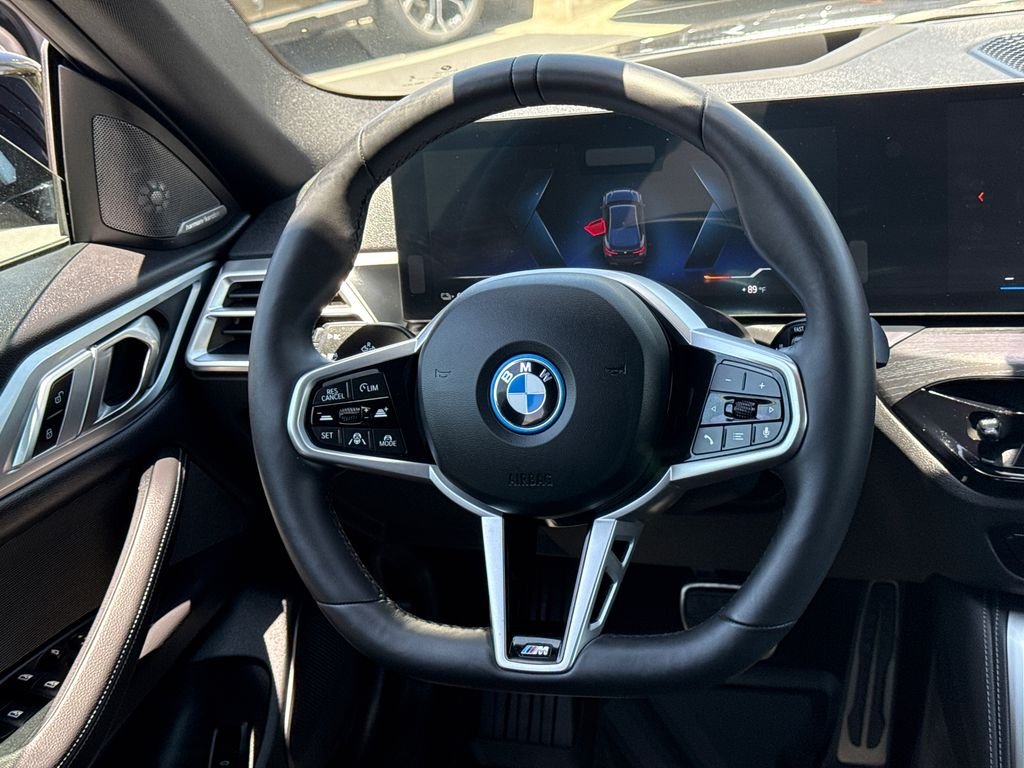 Used 2025 Black Sapphire Metallic BMW eDrive40 image 21