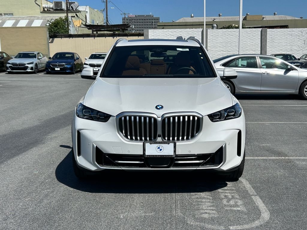 New 2026 Mineral White Metallic BMW xDrive50e image 8