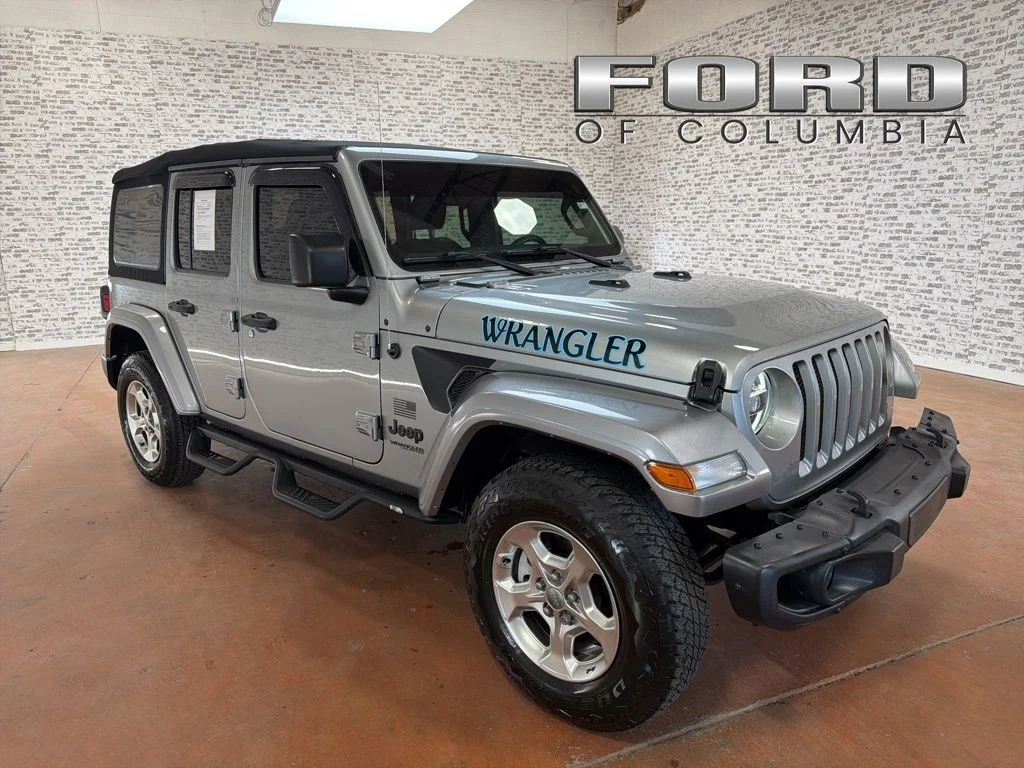 Used 2021 Silver Jeep Unlimited Sport image 1