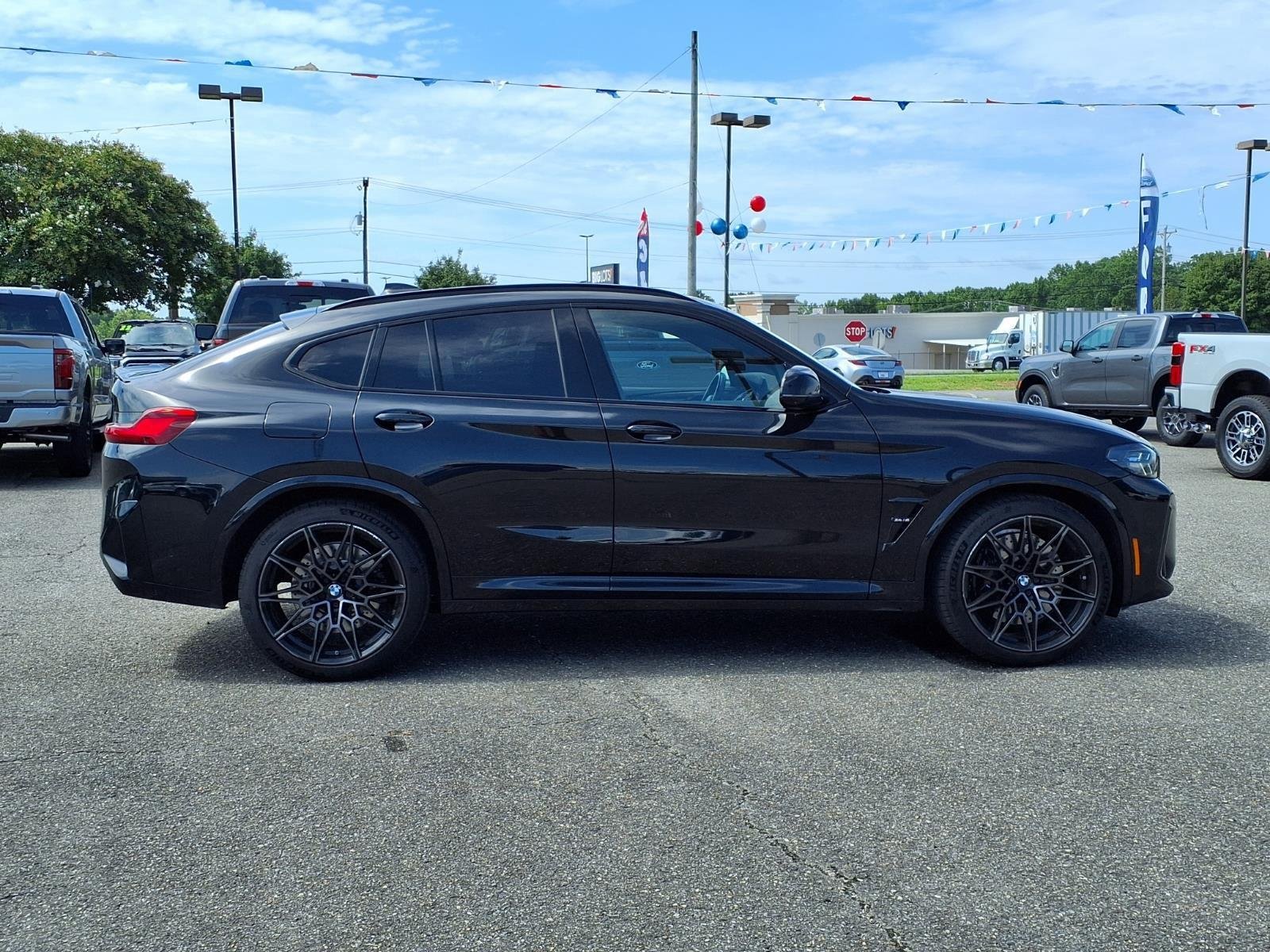 Used 2024 Black Sapphire Metallic BMW  image 12