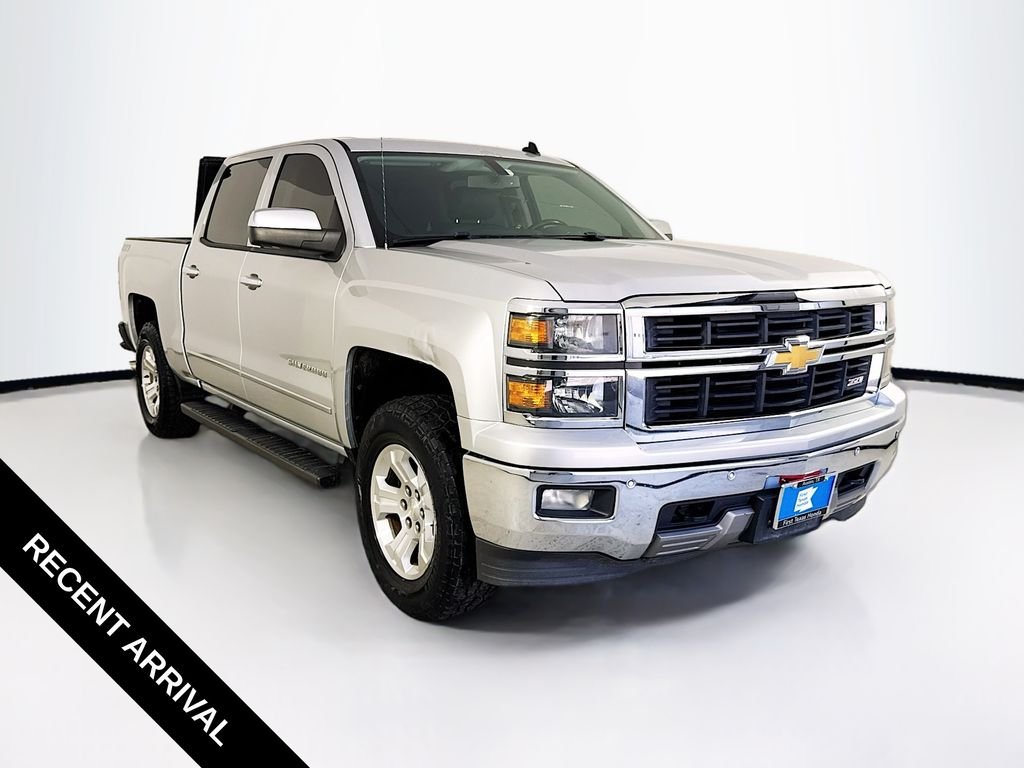 Used 2014 Silver Ice Metallic Chevrolet LTZ image 1