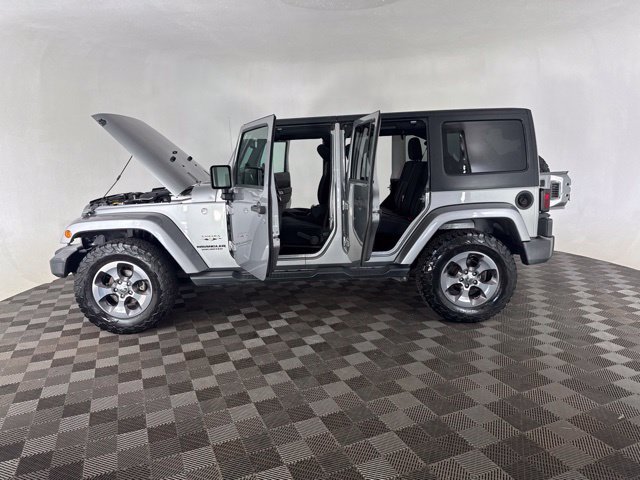 Used 2016 Silver Jeep Unlimited Sahara image 14