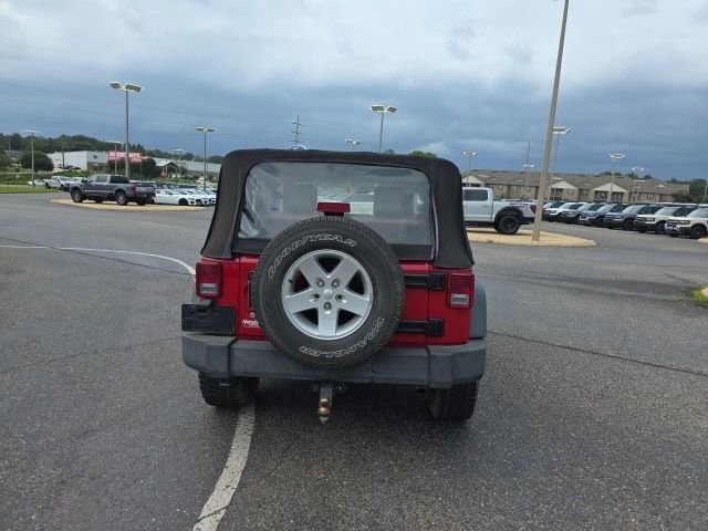 Used 2010 Red Jeep Sport image 4