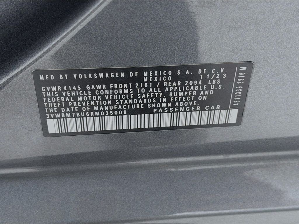 Used 2024 Platinum Gray Metallic Volkswagen Sport Automatic image 30