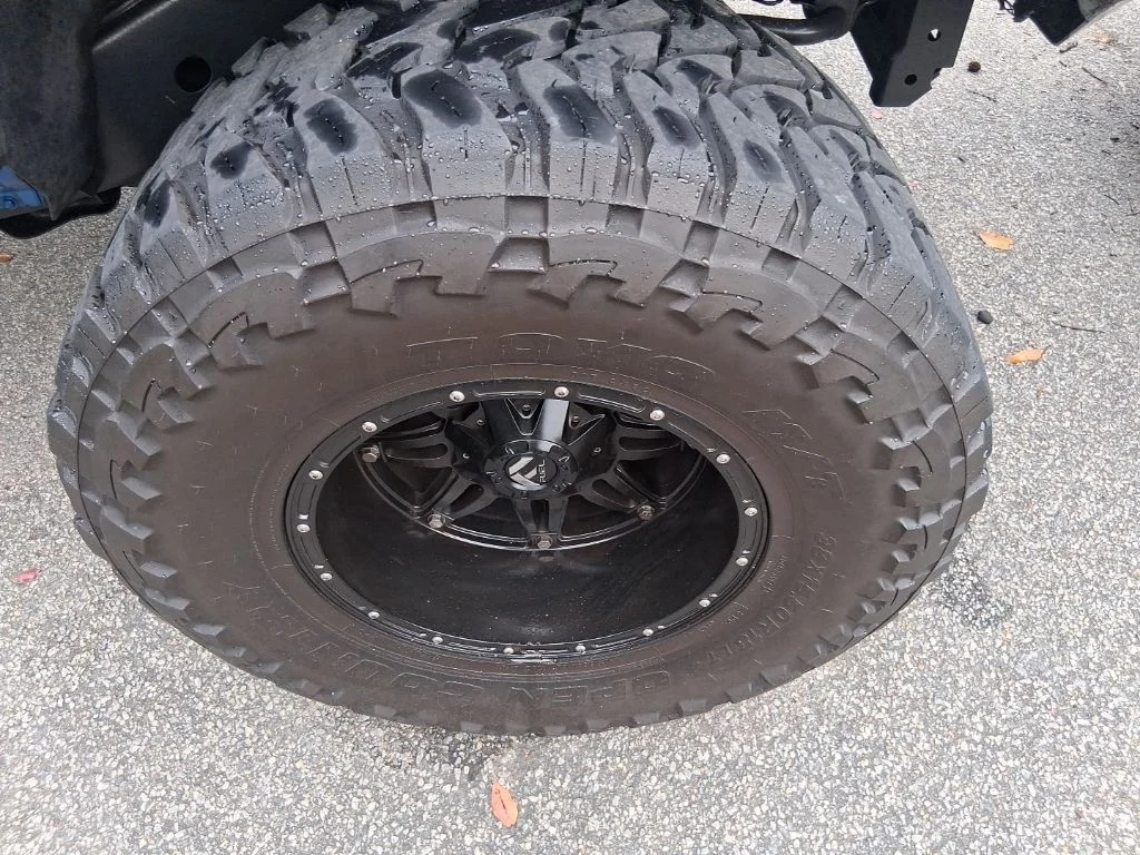 Used 2015 Blue Jeep Unlimited Sport image 4
