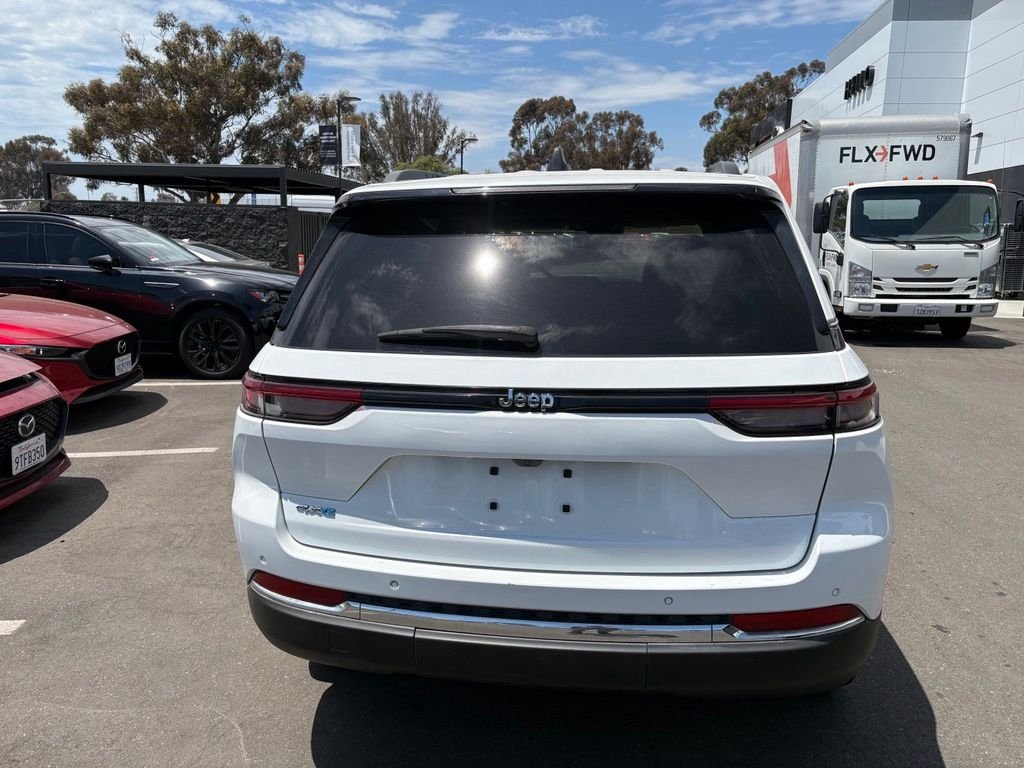 Used 2023 Bright White Clearcoat Jeep 4xe image 9
