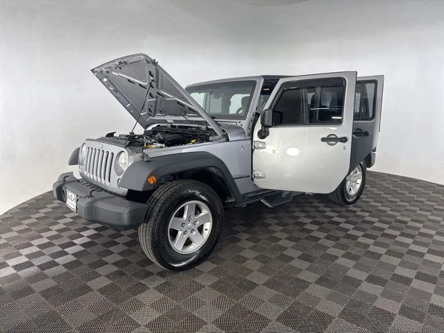 Used 2014 Silver Jeep Unlimited Sport image 12