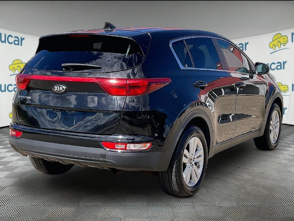 Used 2018 Black Cherry Kia LX image 6