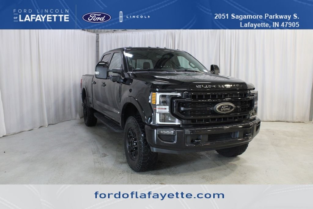 Used 2021 Black Metallic Ford Lariat image 1