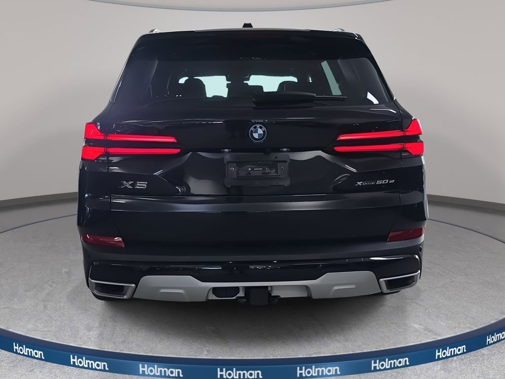 New 2026 Black Sapphire Metallic BMW xDrive50e image 6