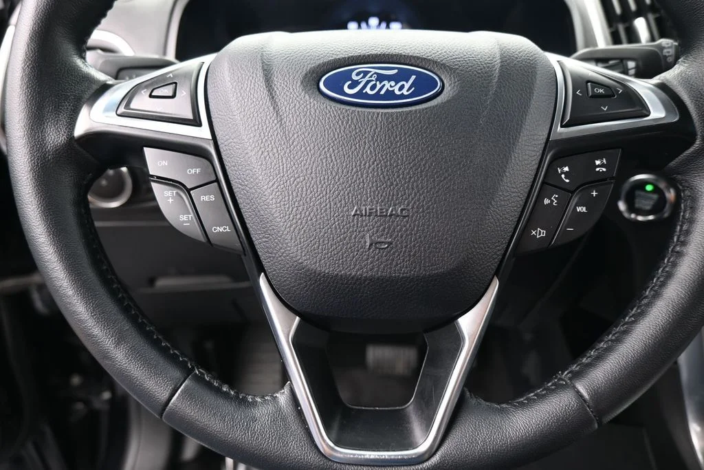 Used 2024 Black Metallic Ford Titanium image 33