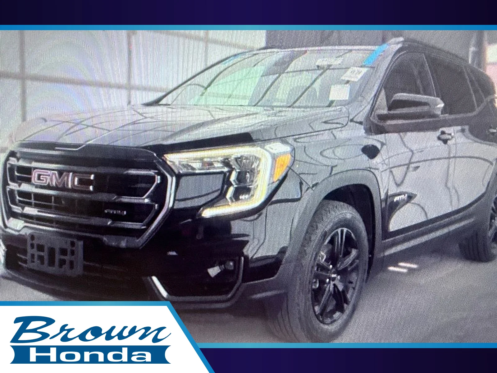 Certified Used 2024 Ebony Twilight Metallic GMC AWD AT4 image 1