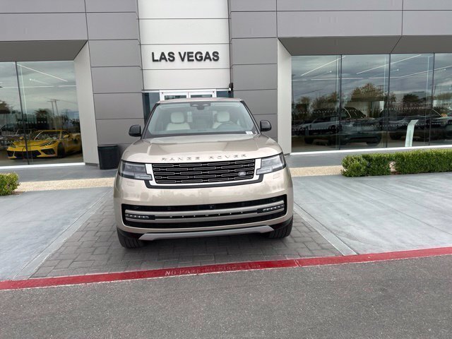 Used 2025 Gold Land Rover SE image 2