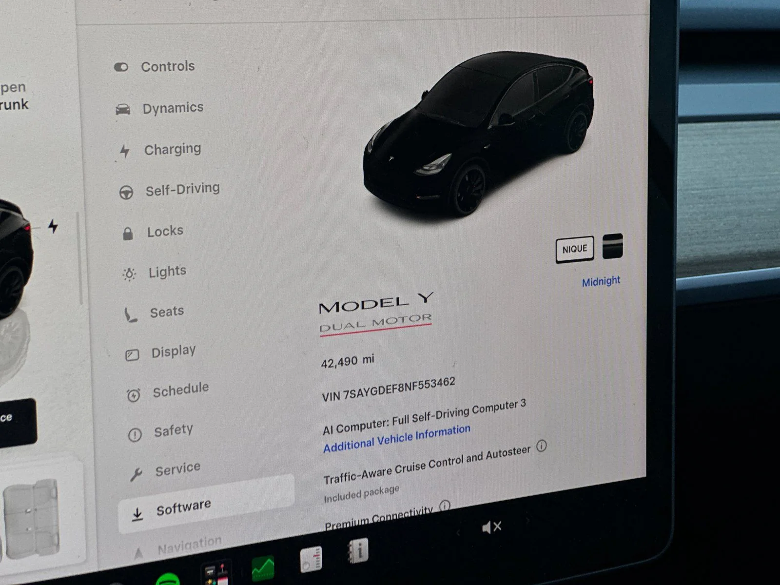 Used 2022 Solid Black Tesla Performance image 26