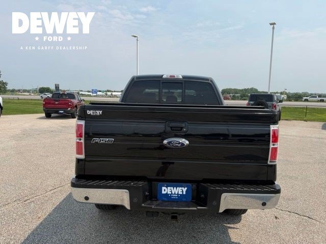 Used 2013 Tuxedo Black Metallic Ford Lariat image 6