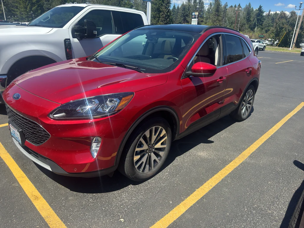 Used 2022 Red Metallic Ford Titanium Hybrid image 1