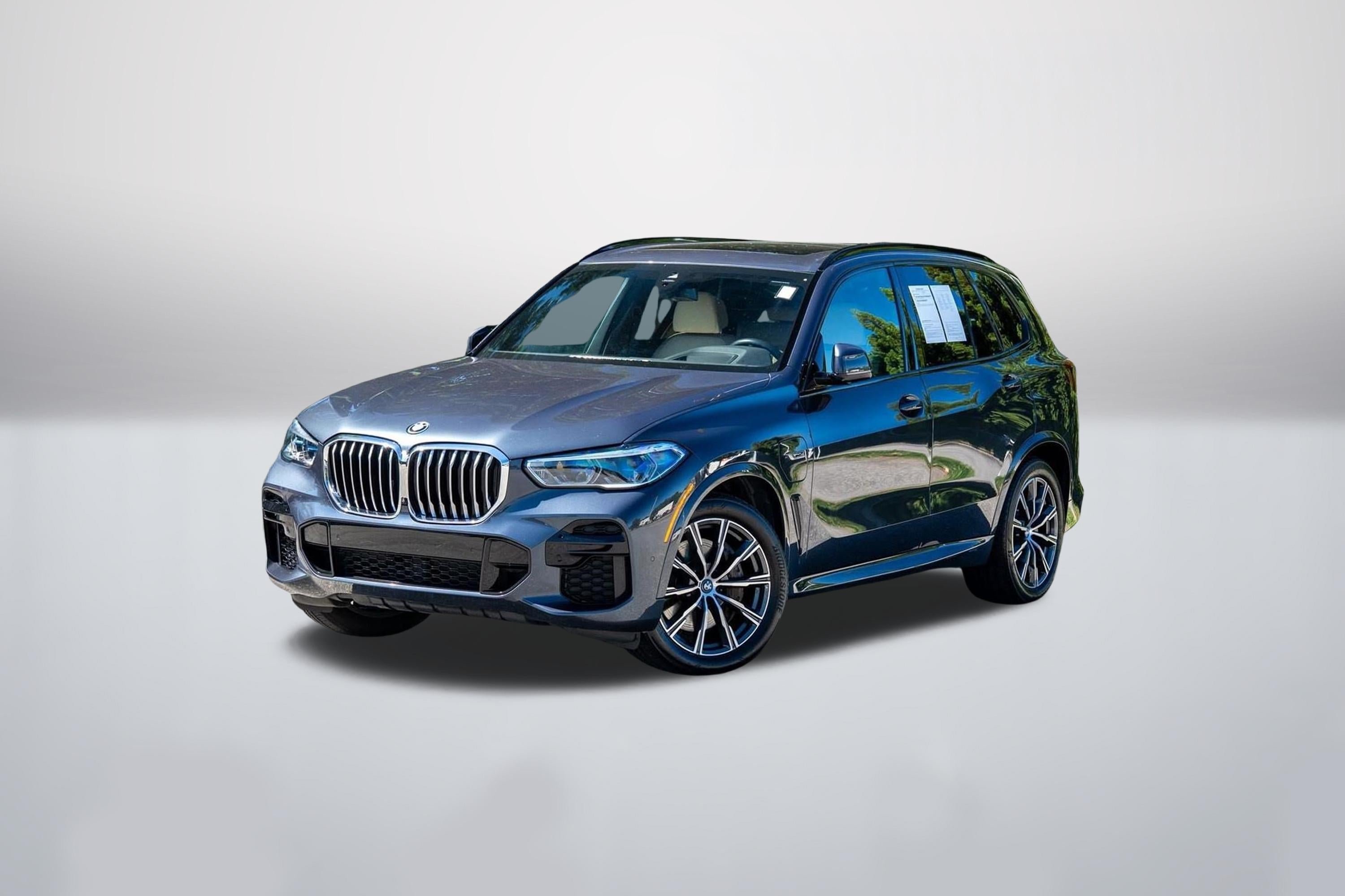 Used 2022 Arctic Grey Metallic BMW xDrive45e image 1