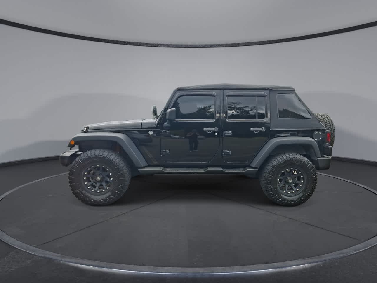 Used 2013 Black Clearcoat Jeep Sport image 5