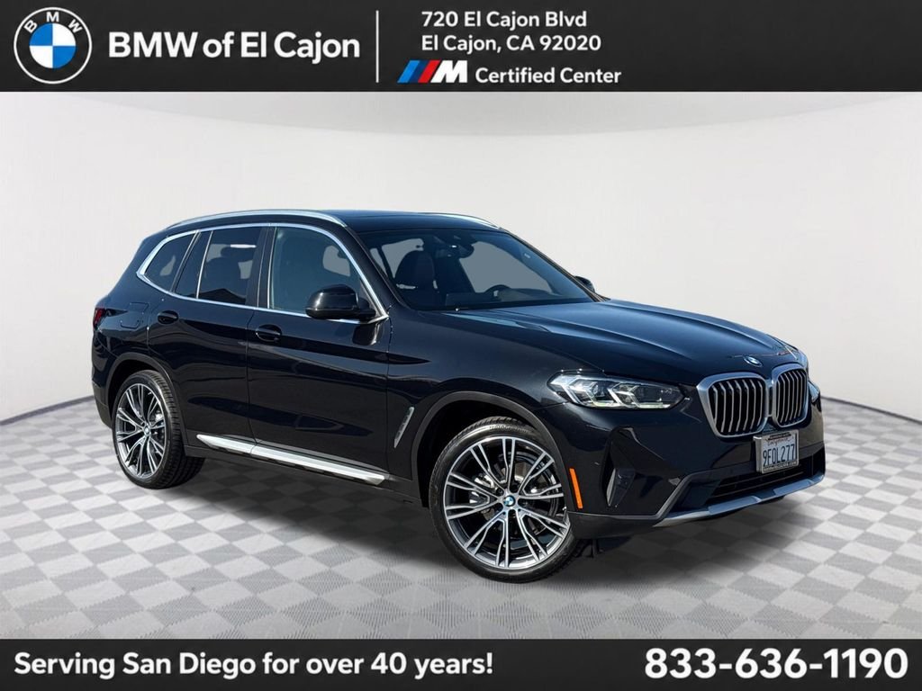 Used 2023 Black Sapphire Metallic BMW sDrive30i image 1