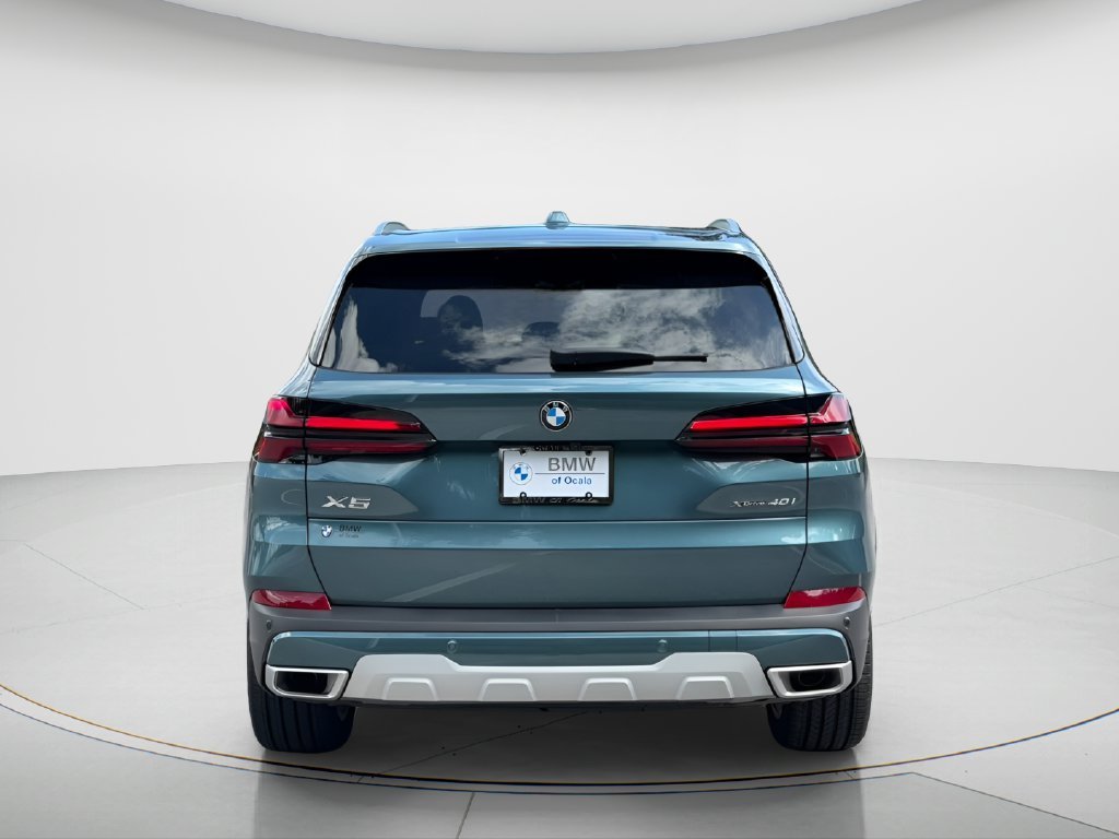Certified Used 2024 Blue BMW xDrive40i image 6